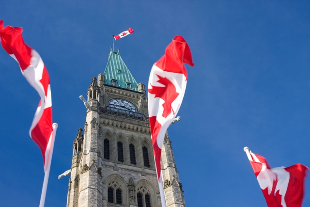 Canadian Parliament with flags