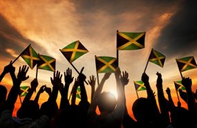 Jamaican people with flags