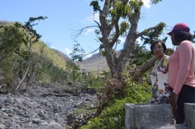 Secretary General Patricia Scotland in Dominica after Hurricane Maria observing the devastation