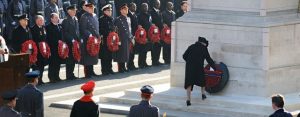 The Queen lays a wreath at the Cenotaph surrounded by high commissioners defence force and other dignataries