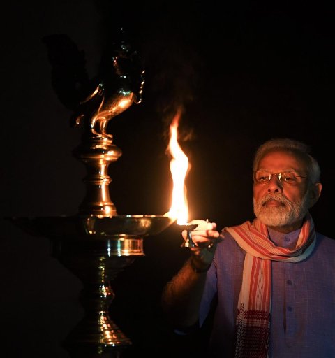 Prime MInister Modi lights a flame