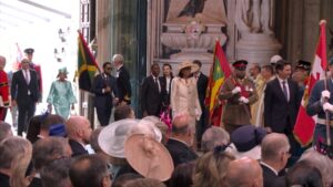 Opinion The Coronation and a changing Commonwealth. Commonwealth flags carried into Westminster Abbey for the Coronation. [photo: TV]