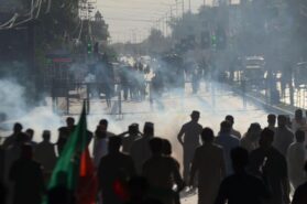 Opinion: Government and judiciary in Pakistan. Picture shows olice fire tear gas to disperse supporters of Imran Khan protesting against the arrest of their leader. [Photo by Hussain Ali/Pacific Press/Sipa USA. Credit: Sipa US/Alamy Live]