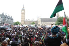 Research Article – An African Union-Caribbean Community alliance in the global reparations movement: promises, perils, and pitfalls. photo shows 2016 march to parliament calling for reparations