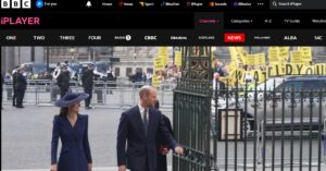 rince William and Princess Kate at Westminster Abbey. Republic protestors in the background [BBC News]